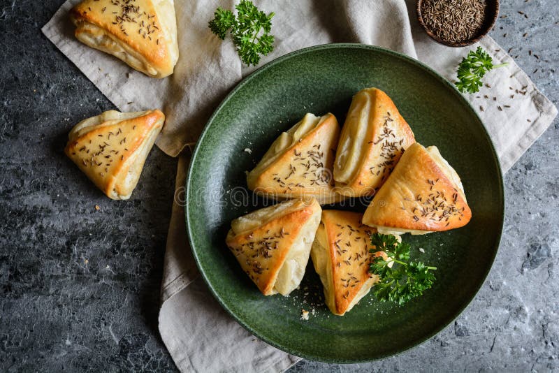 Baked rolls with sheep milk cheese filling