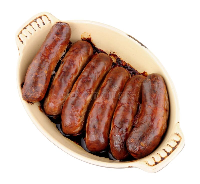 Baked Sausages In An Oven Dish Isolated On A White Background royalty free stock photos Baked Sausages In An Oven Dish Isolated On A White Background royalty free stock photos