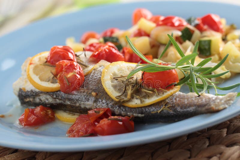 Baked Sea Bass with Vegetables Stock Photo Image of green, closeup