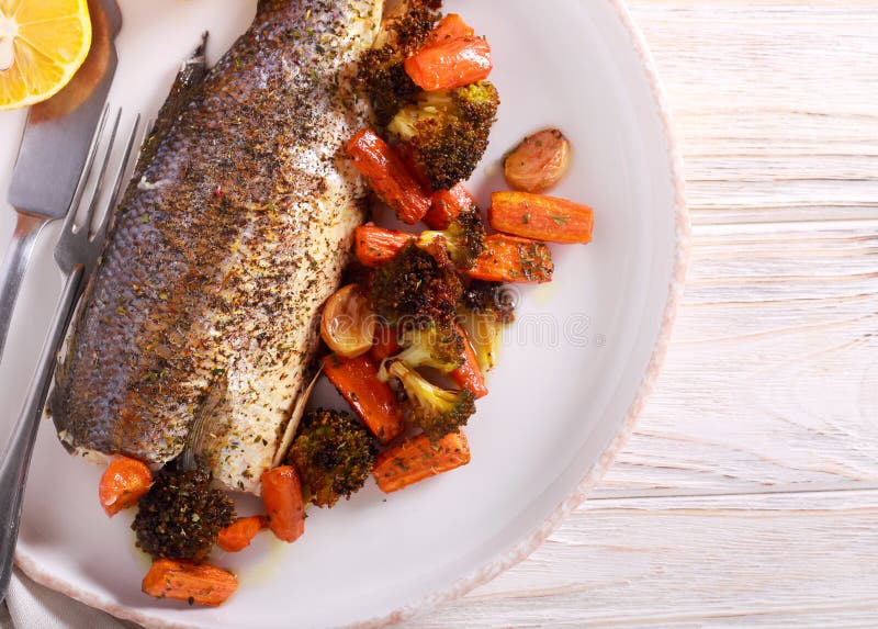 Baked Sea Bass with Vegetables Stock Photo Image of roast, dinner
