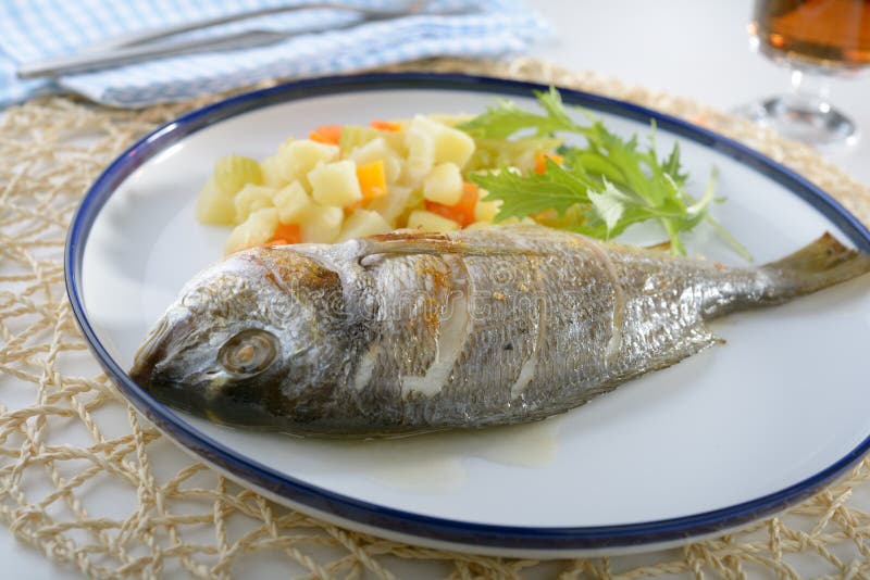 Baked Sea Bream with Vegetables Stock Photo Image of seafood, table
