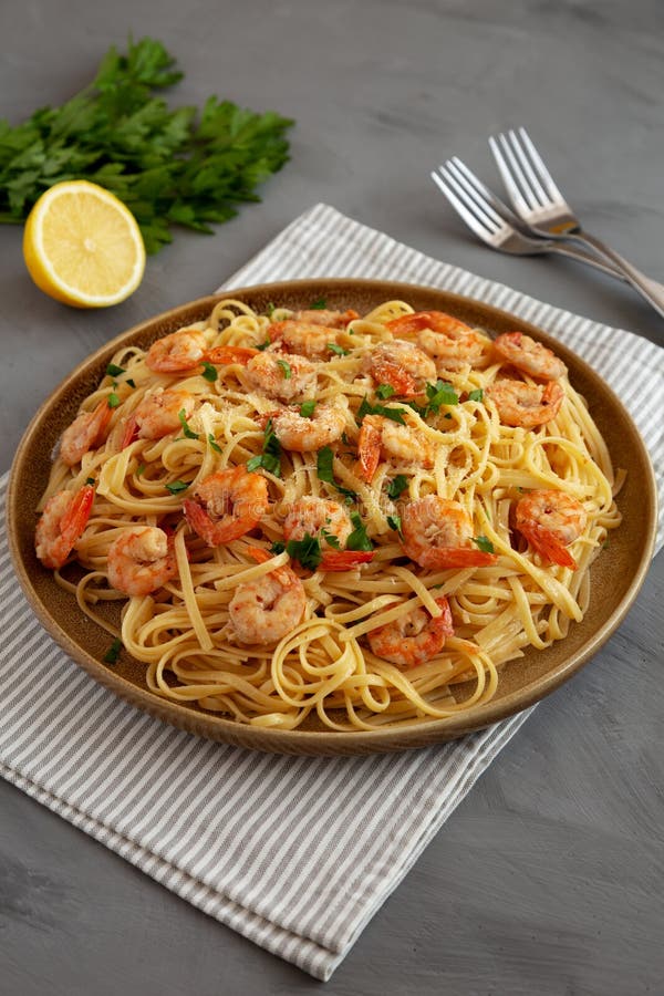 Baked Shrimp Scampi Linguine Pasta with Parsley on a Plate, Side View
