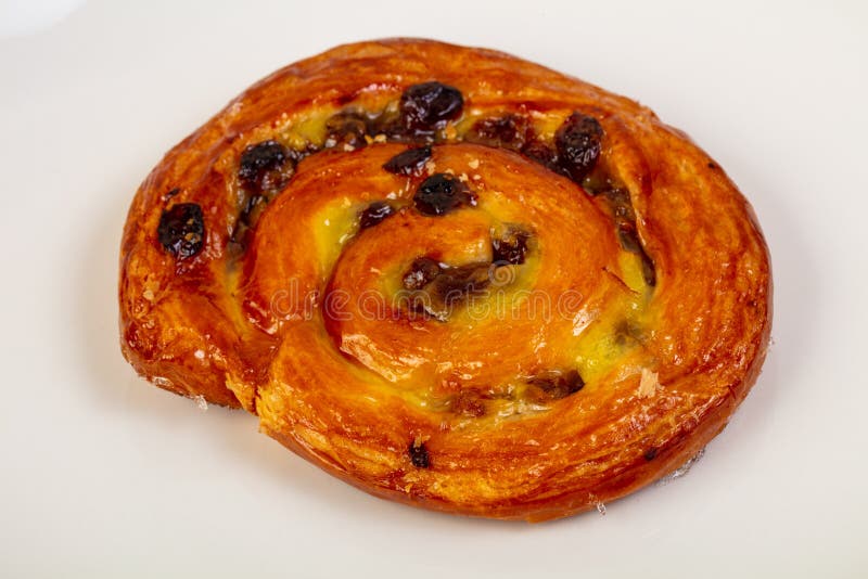 Raisin Snail Bun Close-up Poured with Thick Custard Cream on White ...