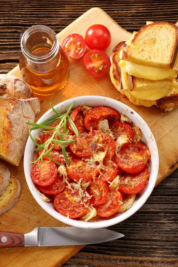 Baked Tomatoes, Corn Bread and Sandwiches with Melted Cheese Stock