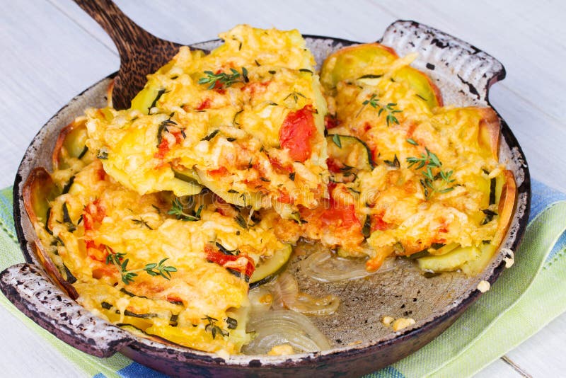 Baked Tomatoes, Zucchini and Potatoes with Thyme and Parmesan Cheese