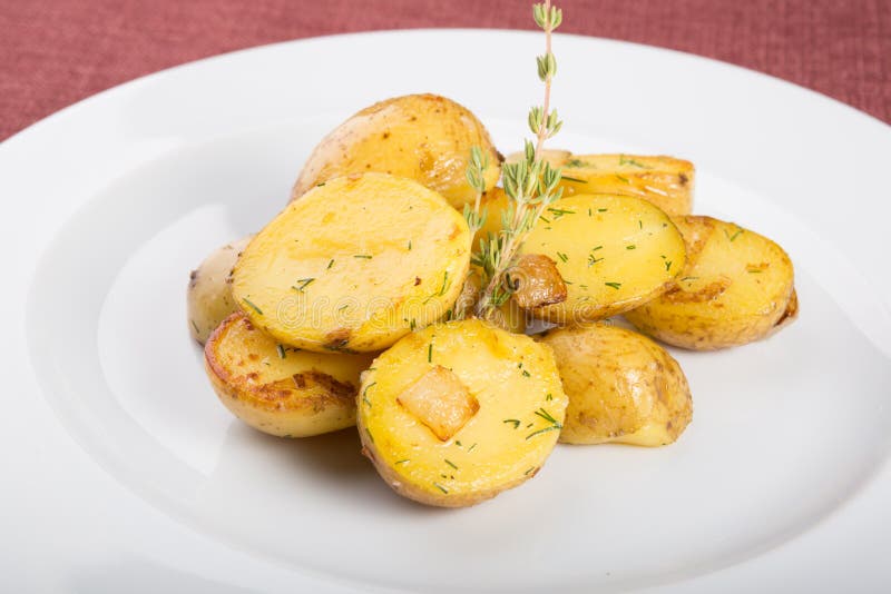 Baked Yellow Potatoes As Garnish Served with Thyme Stock Image Image