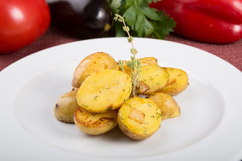 Baked Yellow Potatoes As Garnish Served with Thyme Stock Image Image