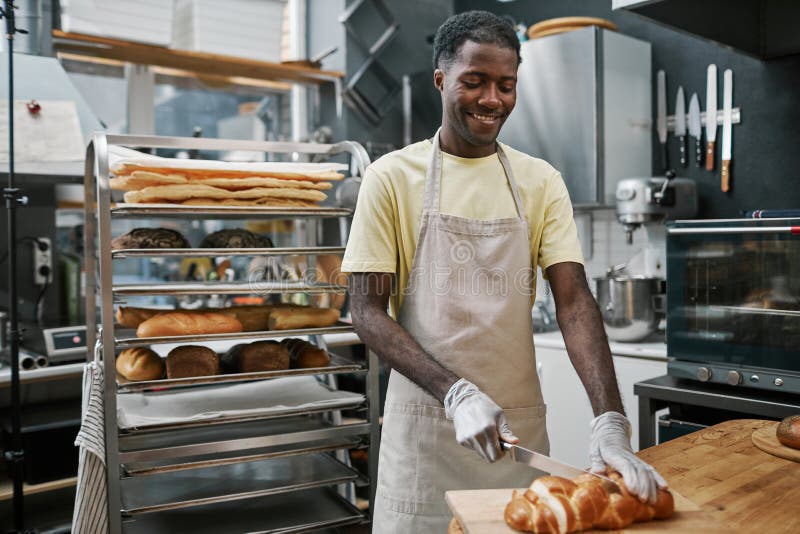 Baker Cutting Freshly Baked Bread Stock Photo Image of cooking