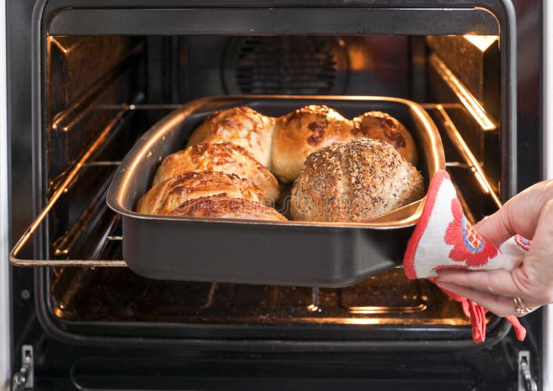 Download Baker's Hand With Bread In Oven Stock Photo - Image of baking, culinary: 25254808