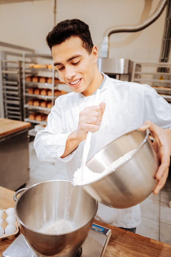 Baker Wearing White Uniform Preparing Everything for Cooking Stock