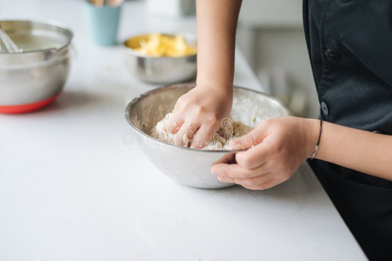 Bakery chef cooking bake in the kitchen professional stock photo Bakery chef cooking bake in the kitchen professional stock photo