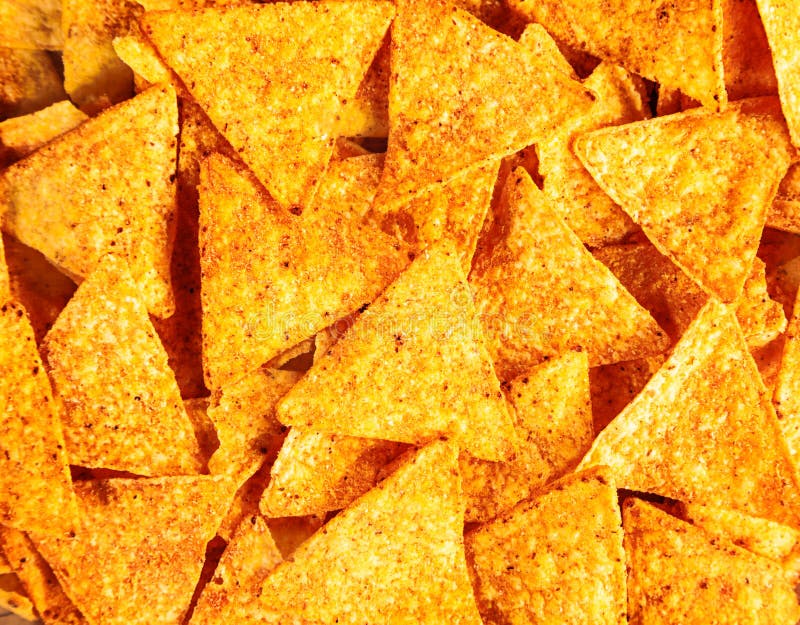 Bakgrund av havretortillor eller nachos arkivfoton Bakgrund av havretortillor eller nachos arkivfoton