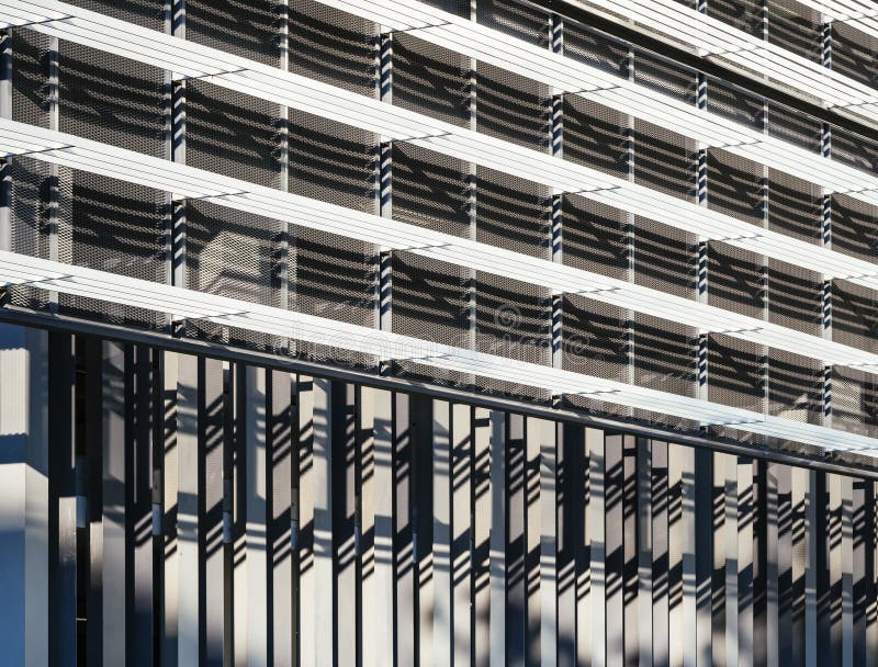 Bakgrund för abstrakt begrepp för fasad för byggnad för arkitekturdetalj modern arkivfoto