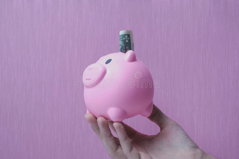 Bakgrund för dollaren för spargrisräddningpengar texturerade rosa royaltyfri foto Bakgrund för dollaren för spargrisräddningpengar texturerade rosa royaltyfri foto