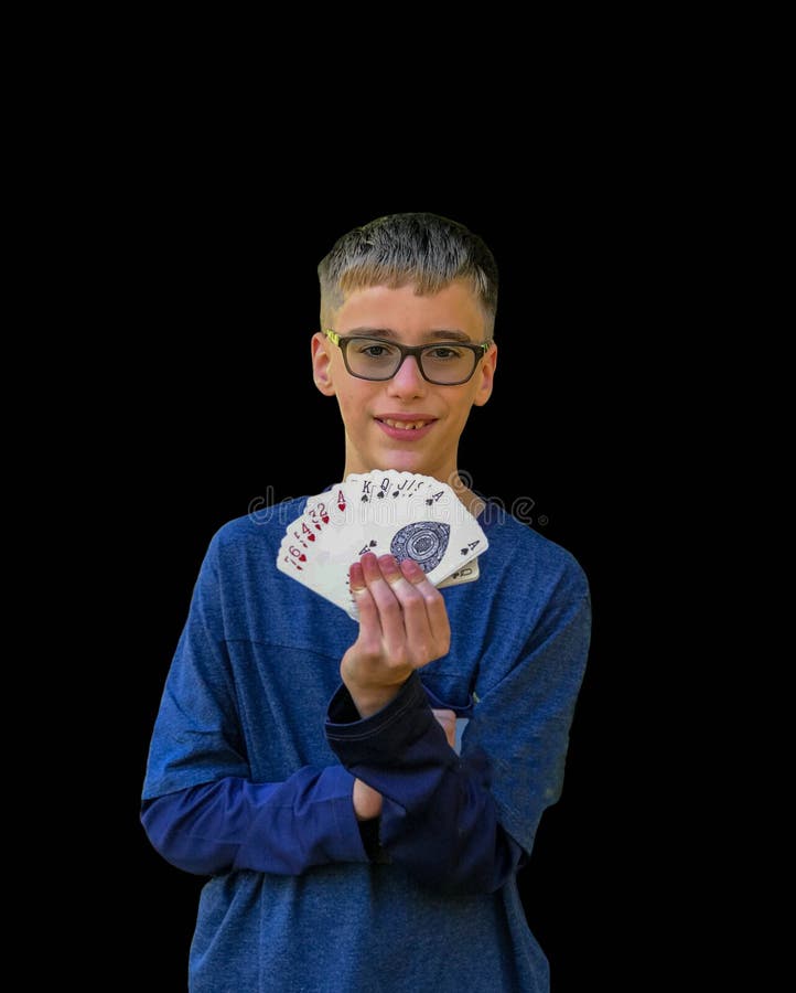 Bakgrund för pojketrollkarlMagic Card Trick svart royaltyfri foto Bakgrund för pojketrollkarlMagic Card Trick svart royaltyfri foto
