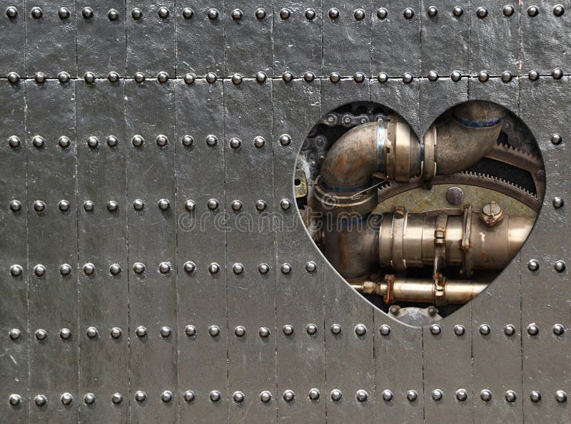 Bakgrund i steampunk med hjärtformade hål i metallpaneler med nitar och rörledningsdetaljer i veteranapparaten arkivbilder