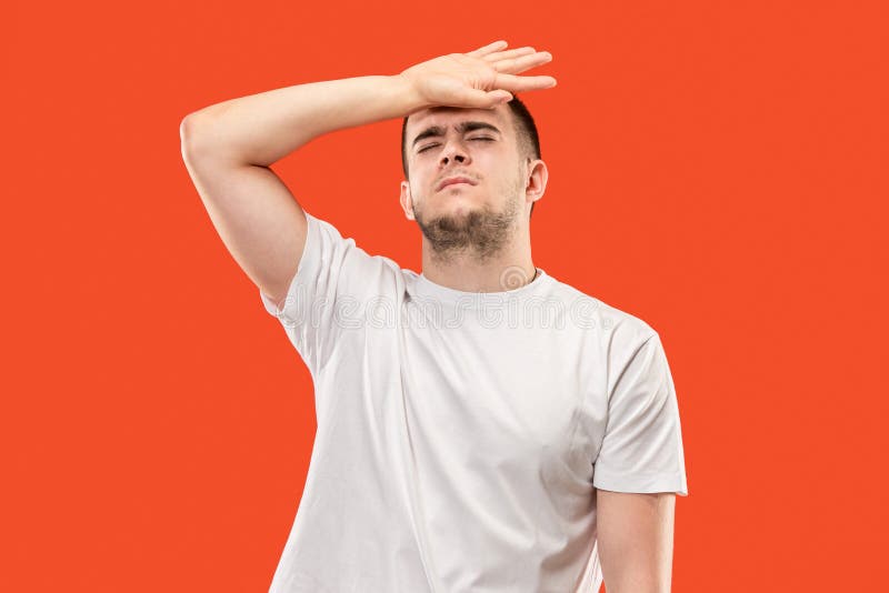 bakgrund som har den huvudvärk isolerade mannen över white Isolerat över orangutangbakgrund royaltyfri bild bakgrund som har den huvudvärk isolerade mannen över white Isolerat över orangutangbakgrund royaltyfri bild