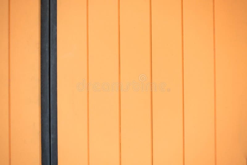Bakgrund till plank för orangea trästängsel arkivfoton Bakgrund till plank för orangea trästängsel arkivfoton