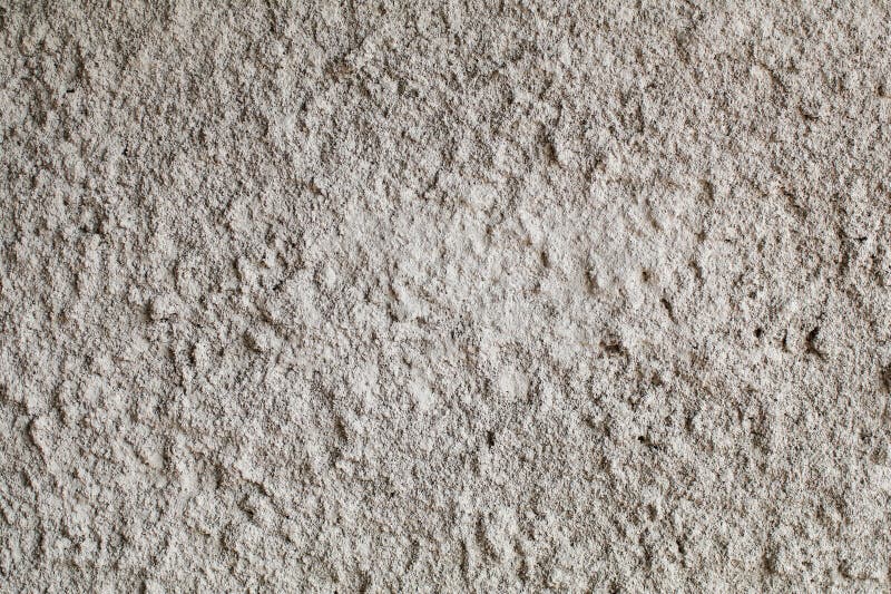 Bakgrundsvägg för vit, grå betongvägg. högdetaljerad fragmentvägg. arkivbild