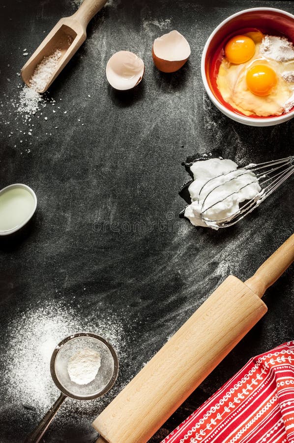 Baking cake ingredients. Bowl, flour, eggs, egg whites foam, eggbeater, rolling pin and eggshells on black chalkboard from above. Cooking course poster background - layout with free text space. Baking cake ingredients. Bowl, flour, eggs, egg whites foam, eggbeater, rolling pin and eggshells on black chalkboard from above. Cooking course poster background - layout with free text space.