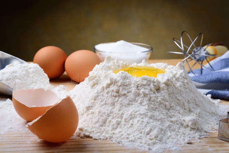 Baking Cakes Ingredients on Pastry Board Flour, Eggs and Sugar. Stock Image Image of