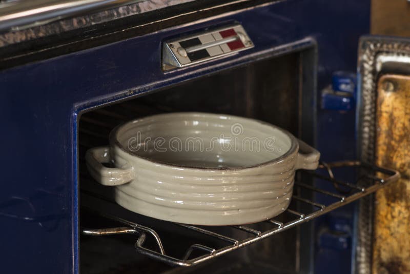 Baking Dish Peering Out of Oven Stock Photo Image of cookware