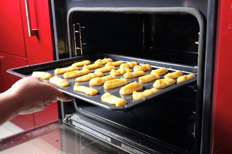 Baking Eclair Cookie in the Oven royalty free stock image Baking Eclair Cookie in the Oven royalty free stock image