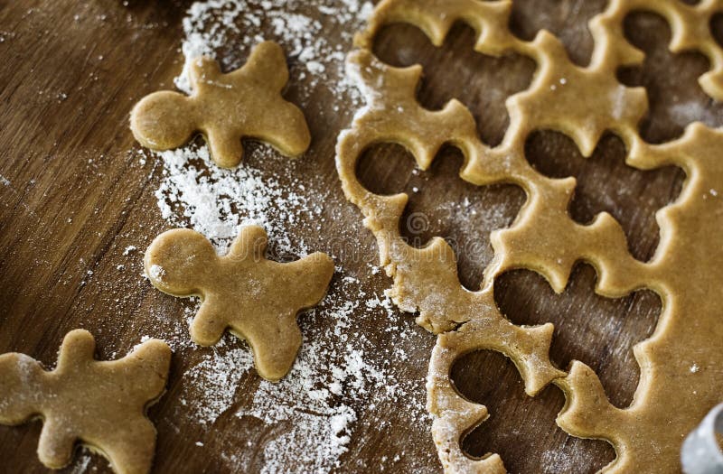 High angle close up of Gingerbread Men on a baking tray. Stock Photo by  Mint_Images