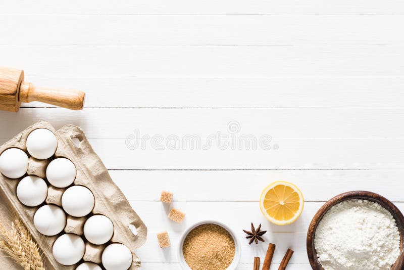 Baking ingredients on white wooden table background royalty free stock photos