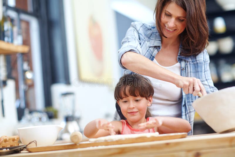 Baking is Love Made Visible. a Mother and Daughter Baking Together