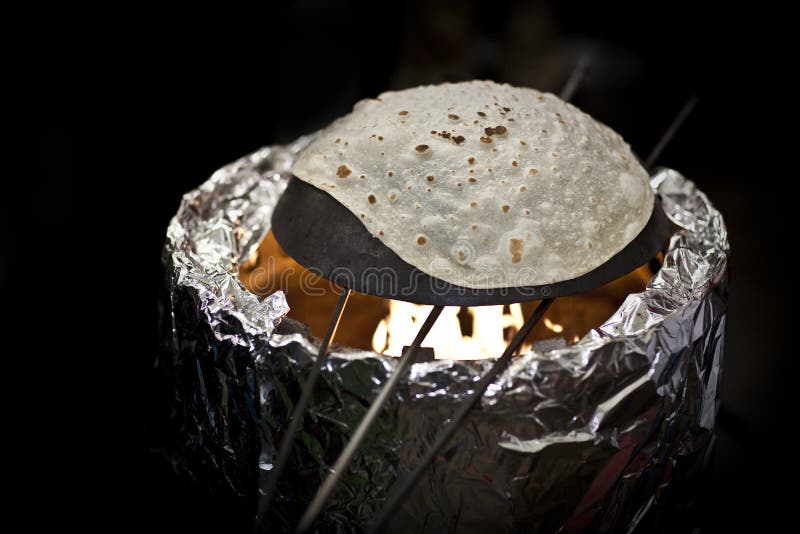 Baking a naan bread close up