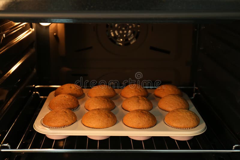 Baking Pan with Cupcakes in Modern Oven Stock Image Image of