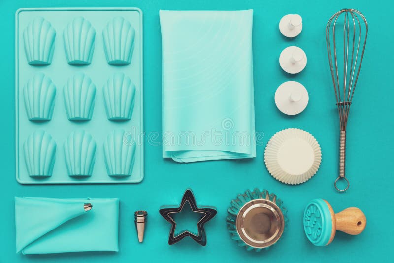 Baking Utensils on Blue Pastel Background. Top View. Flat Lay Stock