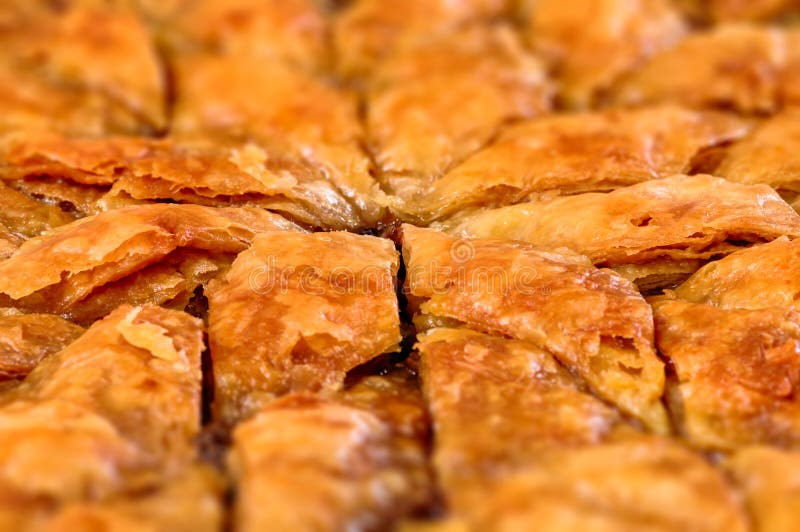 Homemade baklava - Turkish filo sweet pastry soaked in syrup. Homemade baklava - Turkish filo sweet pastry soaked in syrup.