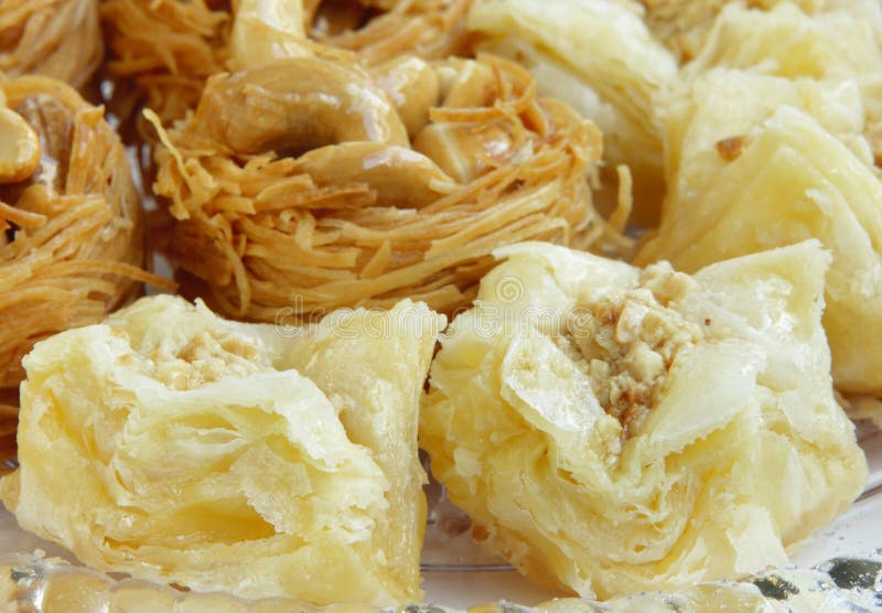 Baklava is a sweet pastry made of layers of phyllo dough filled with chopped nuts and sweetened with syrup or honey. Baklava is a sweet pastry made of layers of phyllo dough filled with chopped nuts and sweetened with syrup or honey