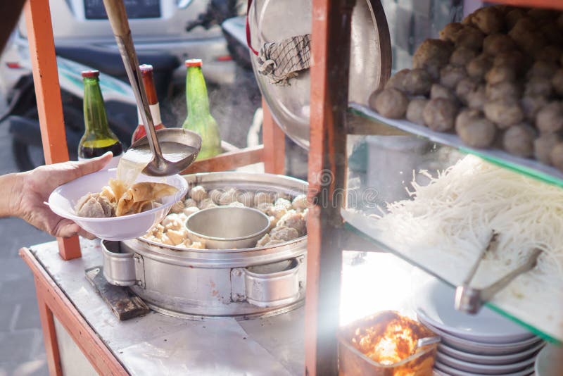 Bakso. indonesian famous meatball street food with soup and noodle being prepared. Bakso. indonesian famous meatball street food with soup and noodle being prepared