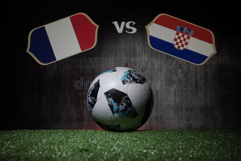 BAKU,AZERBAIJAN - JULY 12, 2018 : Creative concept. Official Russia 2018 World Cup football ball The Adidas Telstar 18 on green gr vector illustration BAKU,AZERBAIJAN - JULY 12, 2018 : Creative concept. Official Russia 2018 World Cup football ball The Adidas Telstar 18 on green gr vector illustration