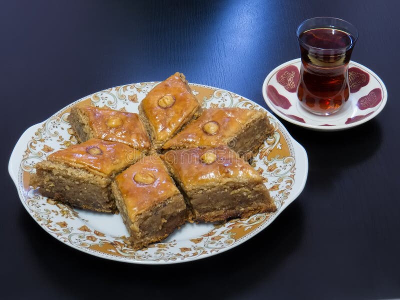 Baku Pakhlava on a Platter with Tea Poured into a Glass of Armud Stock ...