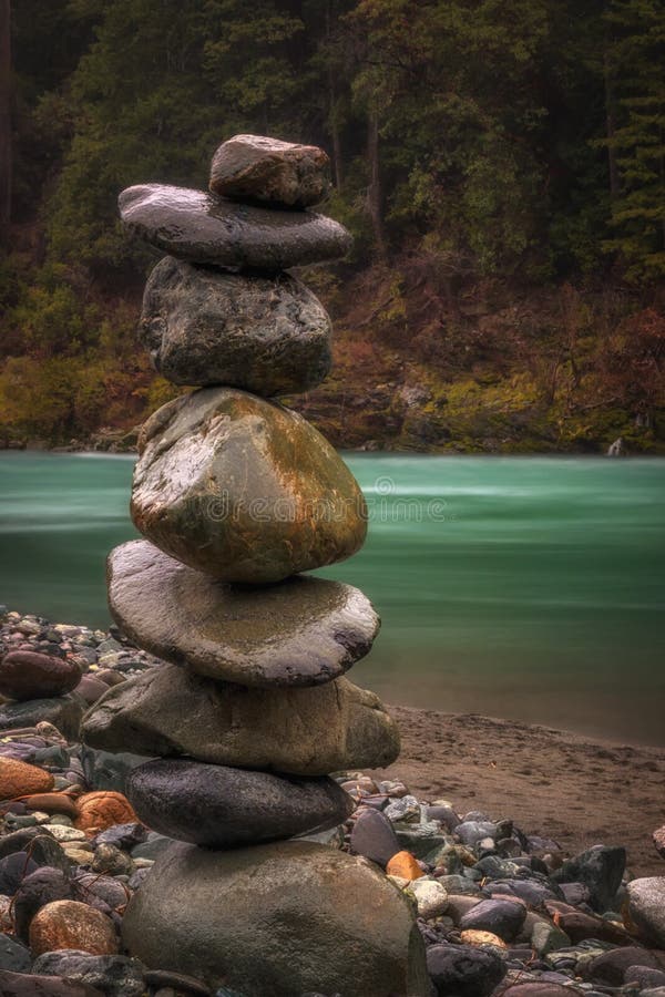 balance-nature-rocks-piled-along-river-r