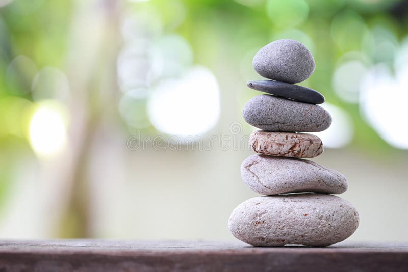 balance-stones-stacked-to-pyramid-soft-nature-green-backg-background-spa-ideas-design-freedom-stability-concept-98011690.jpg