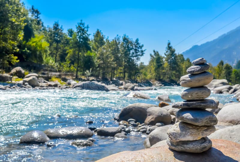Balance and wellness retro spa concept, inspiration, zen-like and wellbeing tranquil composition. Close-up of white pebbles stack stock image Balance and wellness retro spa concept, inspiration, zen-like and wellbeing tranquil composition. Close-up of white pebbles stack stock image