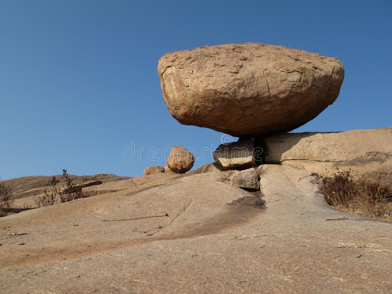 Balancing granite boulder royalty free stock photo