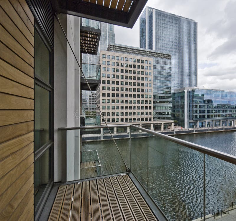 Balcony with city and dock view