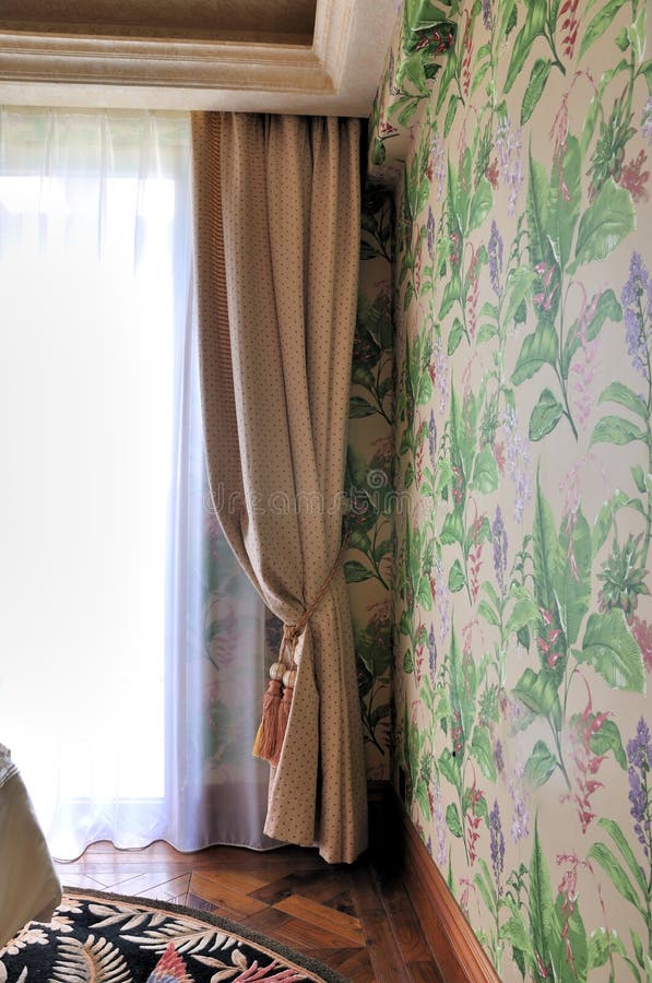 Balcony door with curtain and morning light