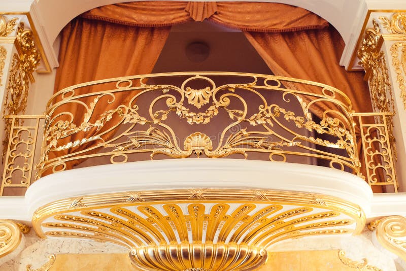 Balcony internal with gold furnish with gold stucco decorative