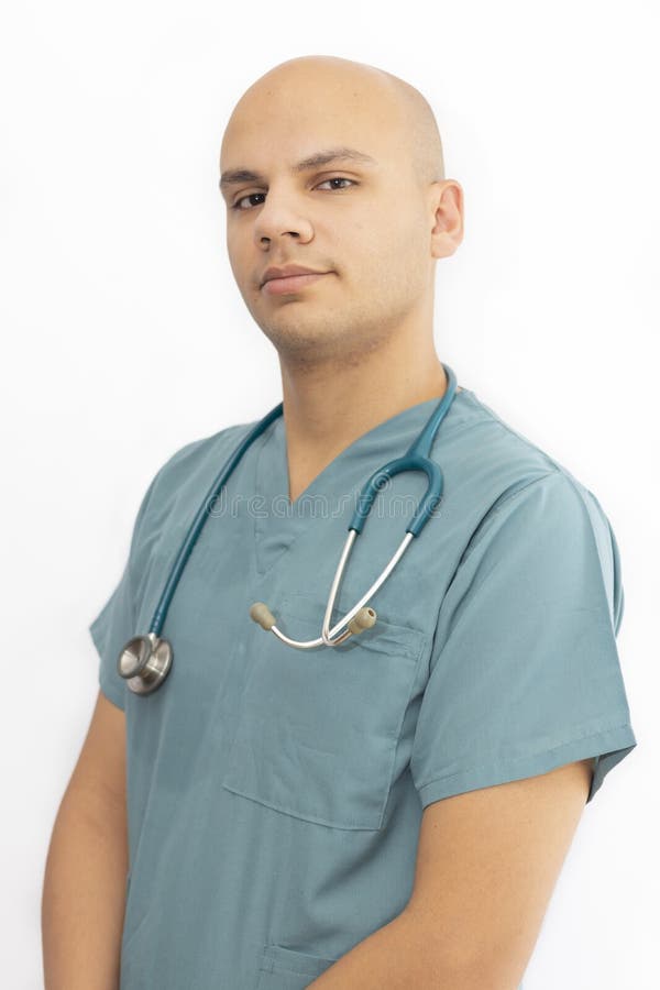 Bald Doctor with Medical Scrubs Stock Photo Image of background