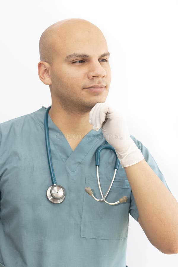 Bald Doctor with Medical Scrubs Stock Photo Image of male, equipment
