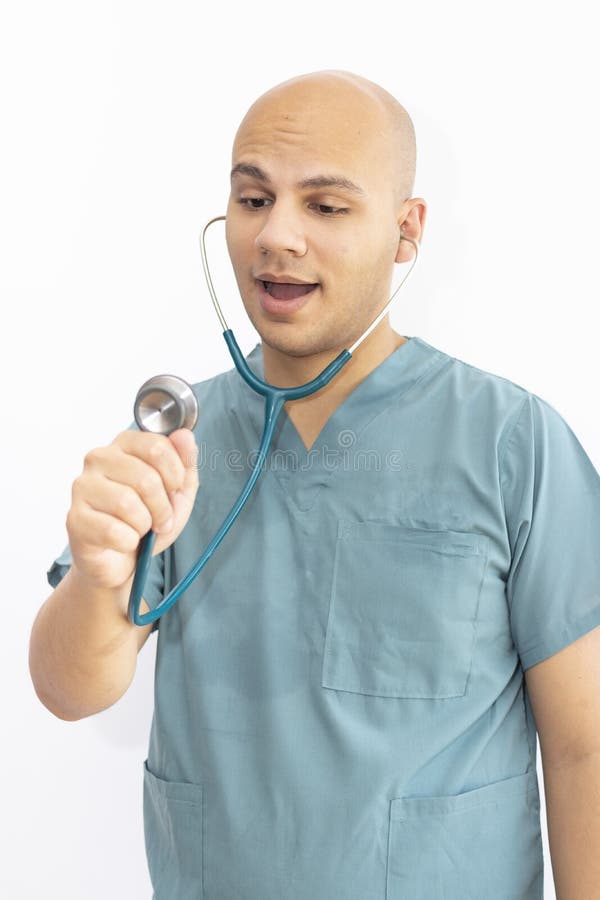 Bald Doctor with Medical Scrubs Stock Photo Image of male, equipment