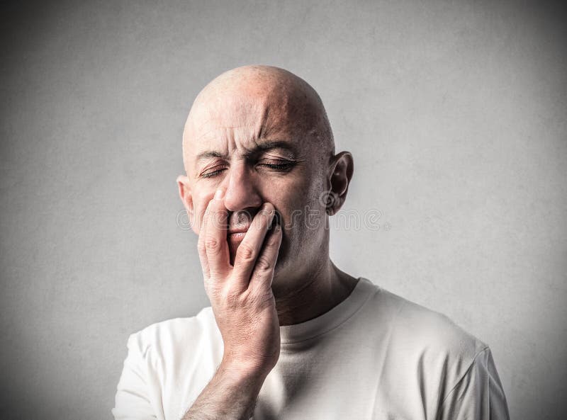 Bald man closing his eyes royalty free stock photo Bald man closing his eyes royalty free stock photo