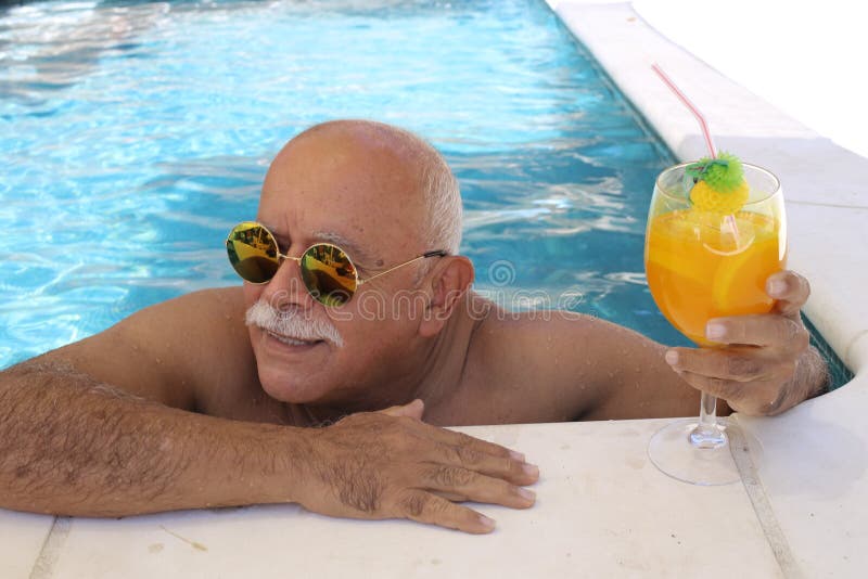 Senior Man Drinking Beer In Swimming Pool Stock Photo Image Of Holiday Eyeglasses